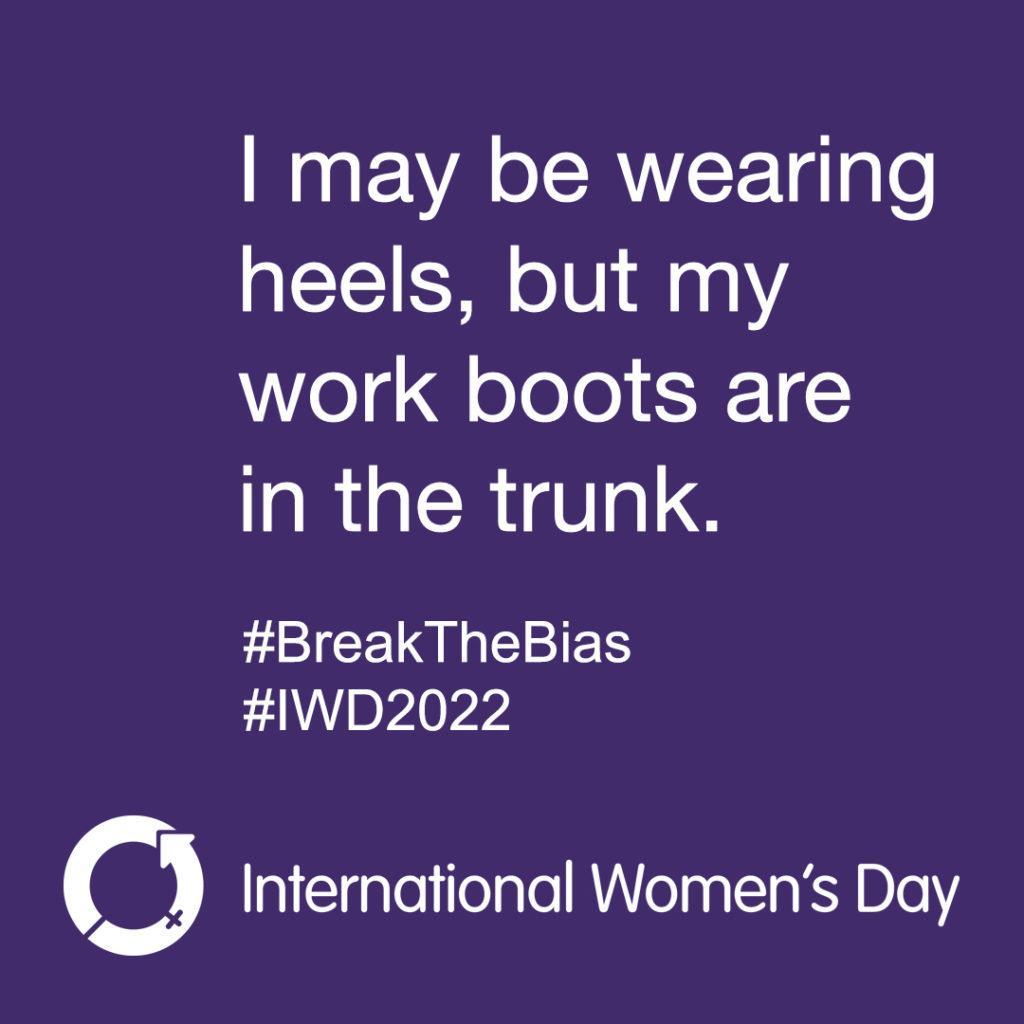 White text on a purple square. "I may be wearing heels, but my work boots are in the trunk. #BreakTheBias #IWD2022 International Women's Day"